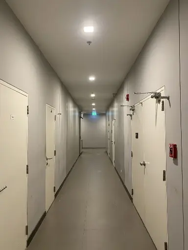 [CASE000165] The door lock or latch in the corridor area is damaged.